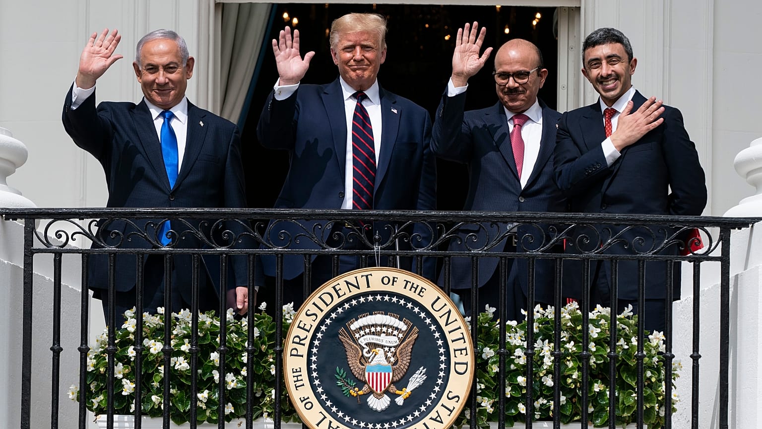 Israeli Prime Minister Benjamin Netanyahu, left, U.S. President Donald Trump, Bahrain Foreign Minister Khalid bin Ahmed Al Khalifa and United Arab Emirates Foreign Minister Ab