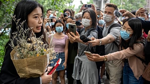 Zhou Xiaoxuan, a former intern at China's state broadcaster CCTV, speaks outside a courthouse on Sept. 14, 2021. 