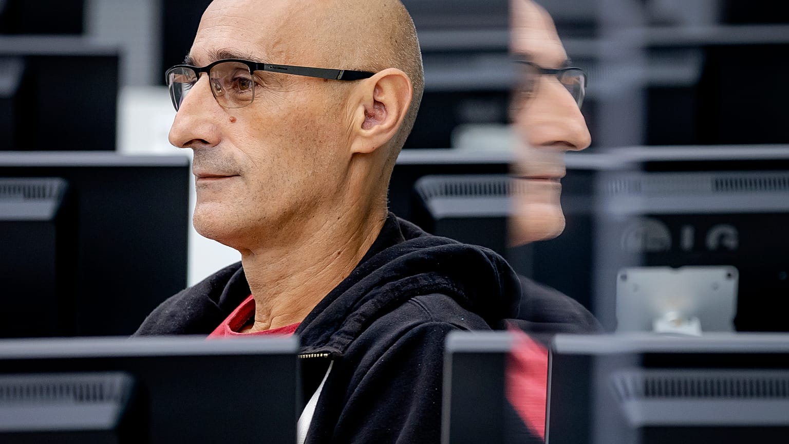 Salih Mustafa waits for the start of his trail at the Kosovo Specialist Chambers court in The Hague.