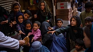 Afghan women in a bread queue in Kabul's old city