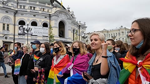 People take part in the annual Gay Pride parade, under the protection of riot police in Kyiv, Ukraine.