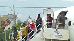 Migrantes haitianos chegam a Port-au-Prince