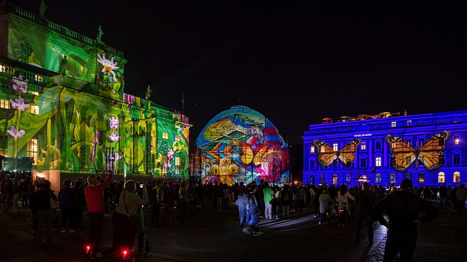 People gather on Bebelplatz for the "Festival of Lights" in Berlin, September, 2021.