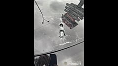 Bullet marks in car's windscreen