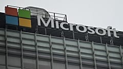 The Microsoft logo is seen at its local headquarters in Beijing on July 20, 2021.