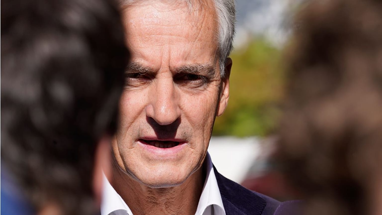 Norway’s Labour Party leader Jonas Gahr Store answers questions from the media outside his home in Oslo