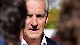 Norway’s Labour Party leader Jonas Gahr Store answers questions from the media outside his home in Oslo