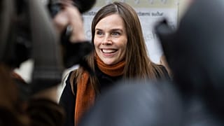 Iceland's Prime Minister Katrin Jakobsdottir speaks to the media after voting at a polling station in Reykjavik, Iceland, Sept. 25, 2021. 