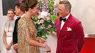 The Duchess of Cambridge, left, speaks to British actor Daniel Craig upon arrival for the World premiere of new James Bond film 'No Time To Die' 