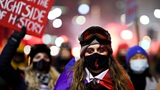 Demonstrators attend a protest against a decision restricting abortion rights in Warsaw, Poland, January 29, 2021