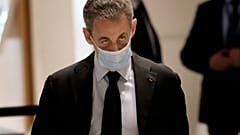 Former French President Nicolas Sarkozy arrives at the courtroom Monday, Nov. 30, 2020 in Paris.