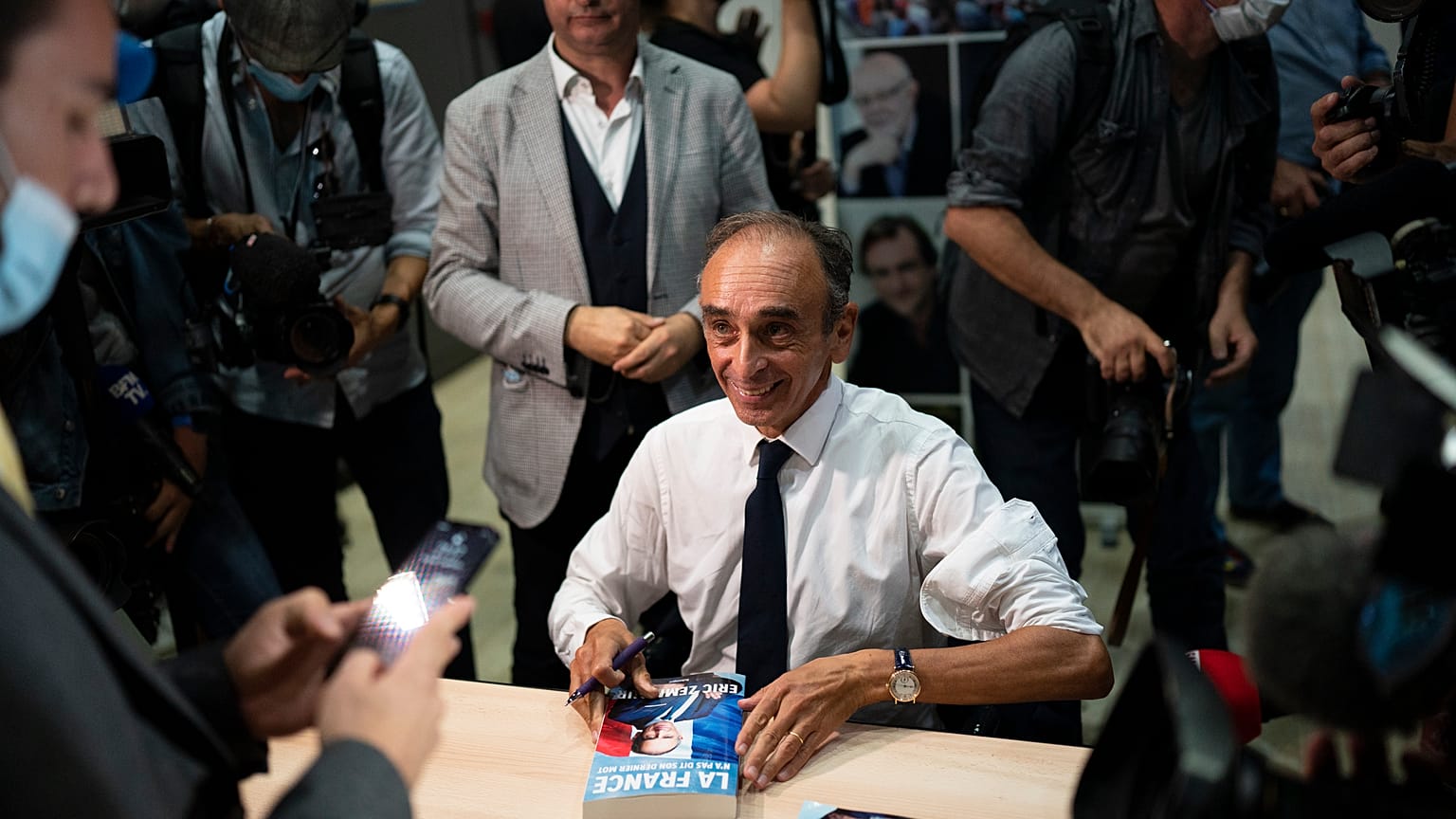 Eric Zemmour signs his latest book Friday, Sept. 17, 2021 in Toulon, southern France.
