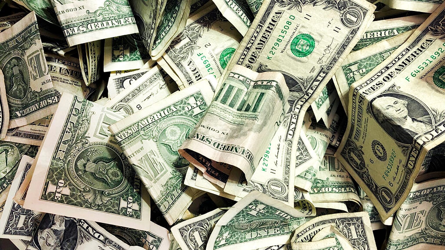 Dollar-Scheine in einer Trinkgeldkasse,21.01.2020