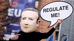 Activists called for the EU to regulate Facebook during a demonstration in December last year