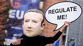 Activists called for the EU to regulate Facebook during a demonstration in December last year