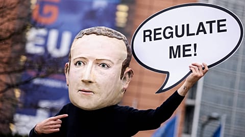 Activists called for the EU to regulate Facebook during a demonstration in December last year