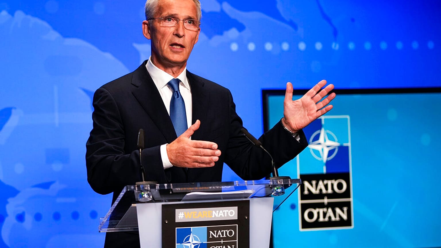 In this Friday, Aug. 20, 2021 file photo, NATO Secretary General Jens Stoltenberg gestures during an online news conference at NATO headquarters in Brussels. 