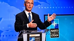 In this Friday, Aug. 20, 2021 file photo, NATO Secretary General Jens Stoltenberg gestures during an online news conference at NATO headquarters in Brussels. 