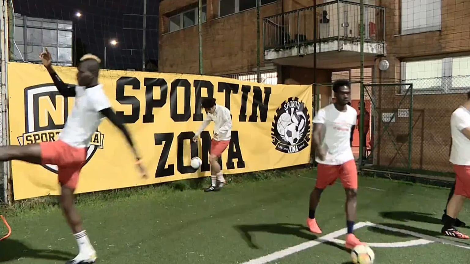 Refugees at the St. Ambroeus football club in Milan.