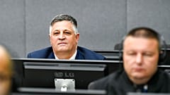 Two leaders of a Kosovo veterans association pleaded innocent Thursday to charges including obstructing justice and intimidation of witnesses, as their trial opened at a court