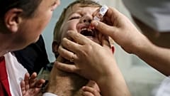 Stock picture: A boy receives polio vaccine drops at a clinic in Kyiv, Ukraine, October 21, 2015