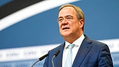 Christian Democratic Union party chairman Armin Laschet speaks to media at the party's headquarters in Berlin, Thursday, Oct. 7, 2021. 