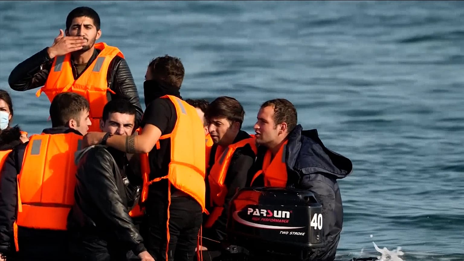 Migrants seen leaving France on boats for UK