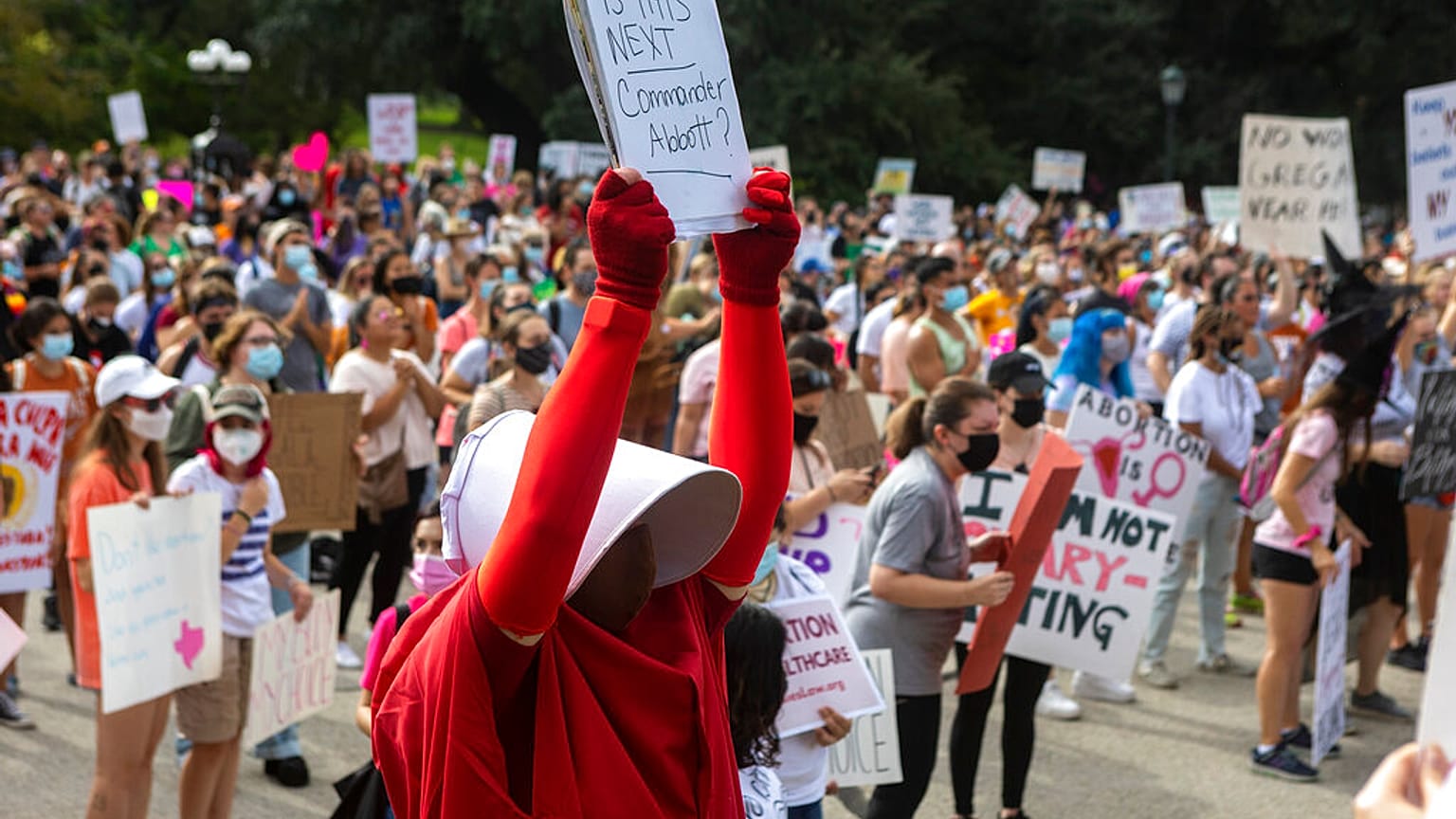 FILE - In this Oct. 2, 2021 - Women's March ATX rally, at the Texas State Capitol in Austin, Texas.