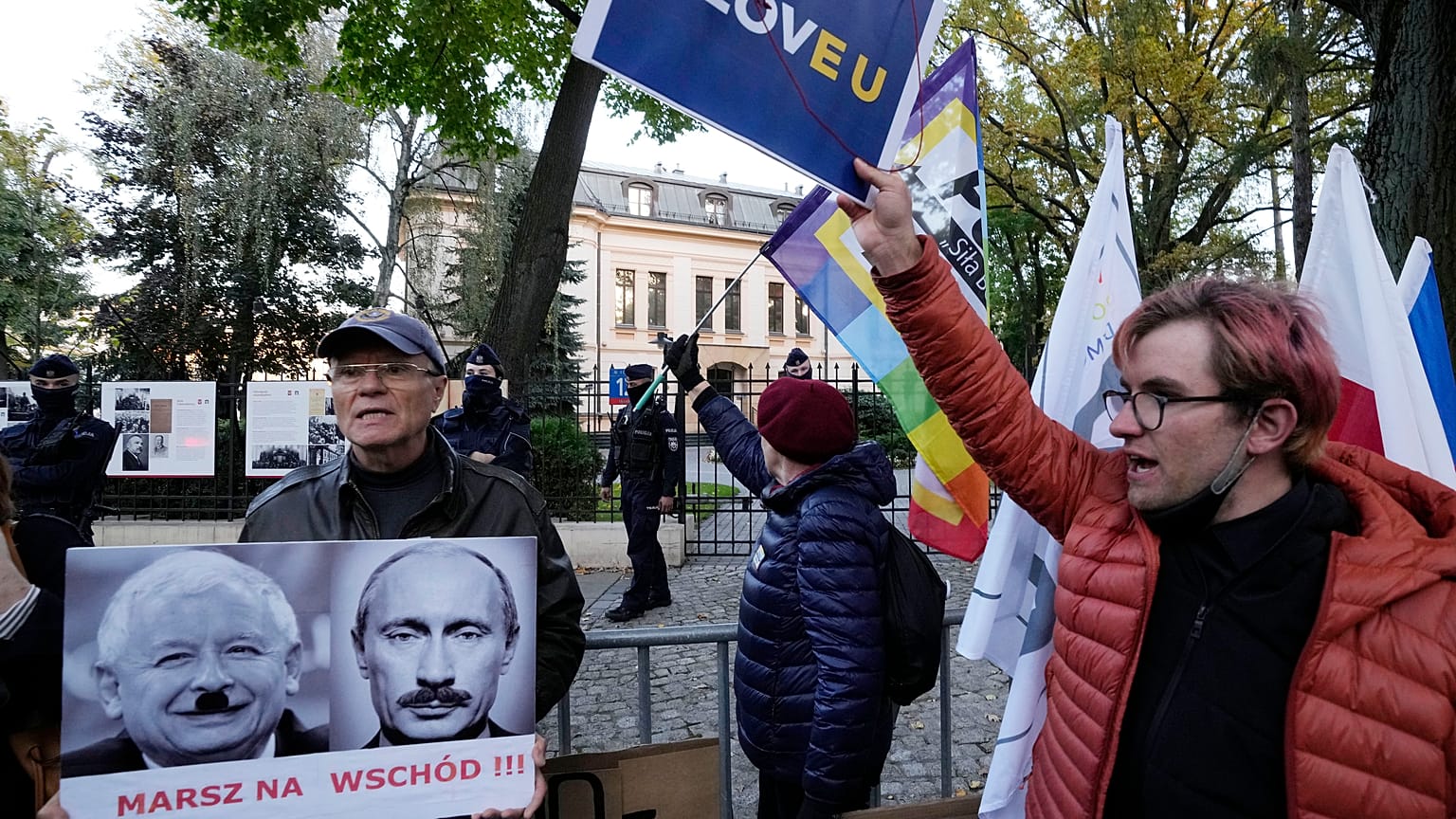 People stage a protest in front of Poland's constitutional court, in Warsaw, Poland, Thursday, October 7, 2021.