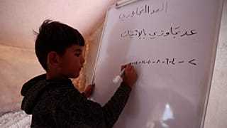 Students return to Idlib classrooms after Covid delays school year