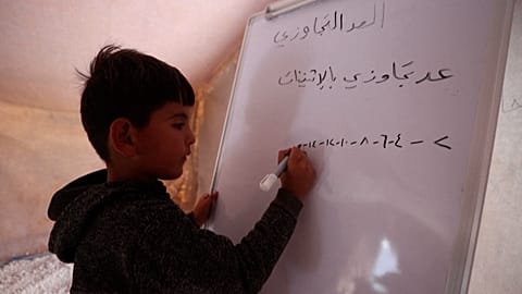 Students return to Idlib classrooms after Covid delays school year