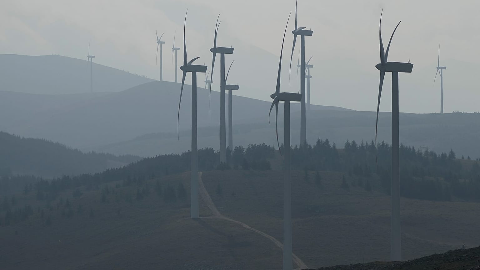 Wind turbines stand out at a wind farm in Collarmele, near L'Aquila, Thursday, Sept. 30, 2021.