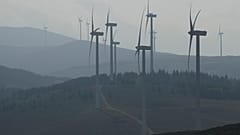 Wind turbines stand out at a wind farm in Collarmele, near L'Aquila, Thursday, Sept. 30, 2021.