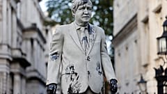 An oil-splattered statue of British Prime Minister Boris Johnson by artist Hugo Farmer installed by Greenpeace activists stands at Downing Street