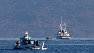 Σκάφος του λιμενικού και ψαράδικο στα ανοιχτά της Κω - φώτο αρχείου