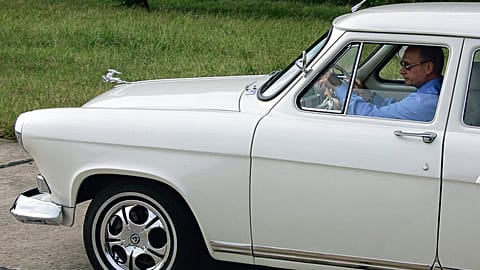 Archive from Vladimir Putin driving a Volga GAZ-21