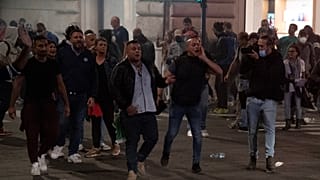 Forza Nuova leader Giuliano Castellino (C) shout during clashes after a protest against the compulsory "green pass" to limit the spread of COVID-19, Rome, October 9, 2021.