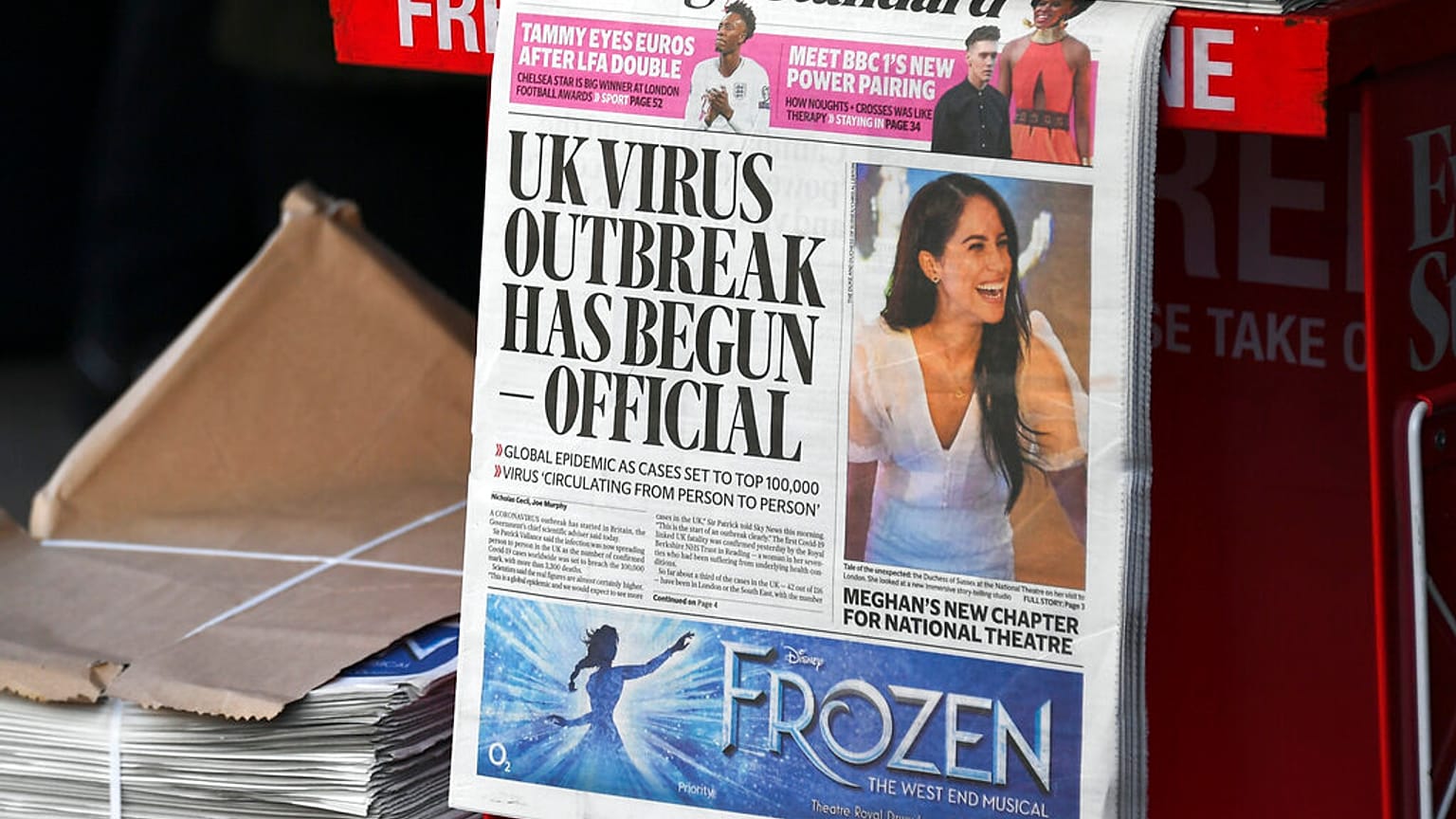 In this Friday, March 6, 2020 file photo, the front page of the Evening Standard is displayed at Bond Street Station, in London.