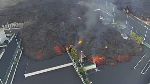 Aerial shot lava and smoke at the industrial park Callejón de la Gata