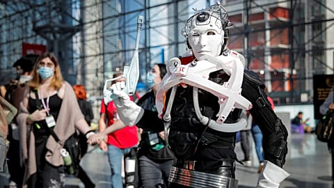 A fan in costume poses at the 2021 New York Comic Con at the Javits Center in Manhattan, New York, U.S., October 7, 2021. 