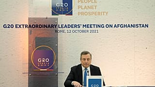 Italian Premier Mario Draghi during a press conference at the end of a virtual summit of the Group of 20 dedicated to Afghanistan in Rome, Tuesday, Oct. 12, 2021.