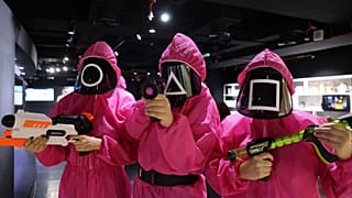 Participants take part in an event where they play the games of Netflix smash hit "Squid Game" at the Korean Cultural Centre in Abu Dhabi, on October 12, 2021.