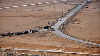 صورة لوكالة الأنباء السورية الرسمية (سانا) القوات السورية في مدينة تدمر الأثرية قرب حمص.