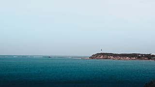 The unique island is surrounded by by the sea. 