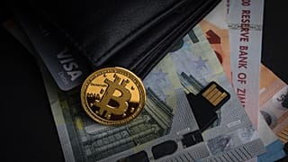 Bitcoin as a completely unregulated means of payment is questionable and very risky making it seem less suitable as a medium of exchange.