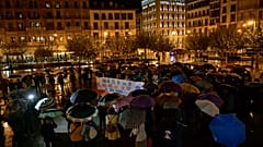 In this Monday, Nov. 4, 2019 file photo, a woman holds a sign that reads: "Only Yes is Yes", as people gather at Plaza del Castillo square in Pamplona, Spain.