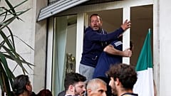 Demonstrators climb through a window outside the CGIL (Italian General Confederation of Labour) union during an anti-Green Pass protest 