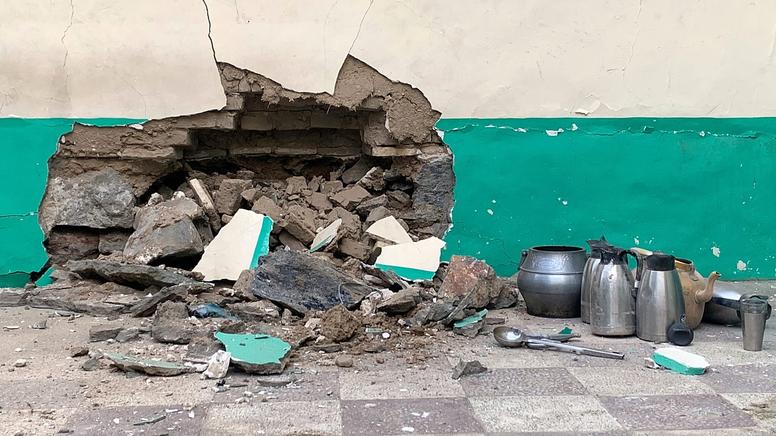Damaged wall of a mosque is seen following a suicide bombers attack in the city of Kandahar, southwest Afghanistan, Friday, Oct. 15, 2021. 