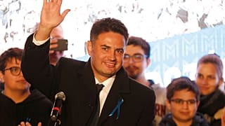 Conservative independent candidate Peter Marki-Zay celebrates in Budapest, Hungary, Sunday, Oct. 17, 2021, after he won an opposition primary race.