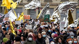 Protest in solidarity with migrants who have been pushed back at Poland's border with Belarus, in Warsaw, Poland